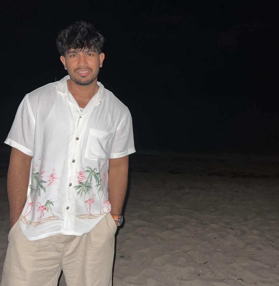 MD Rabbi on the beach at night