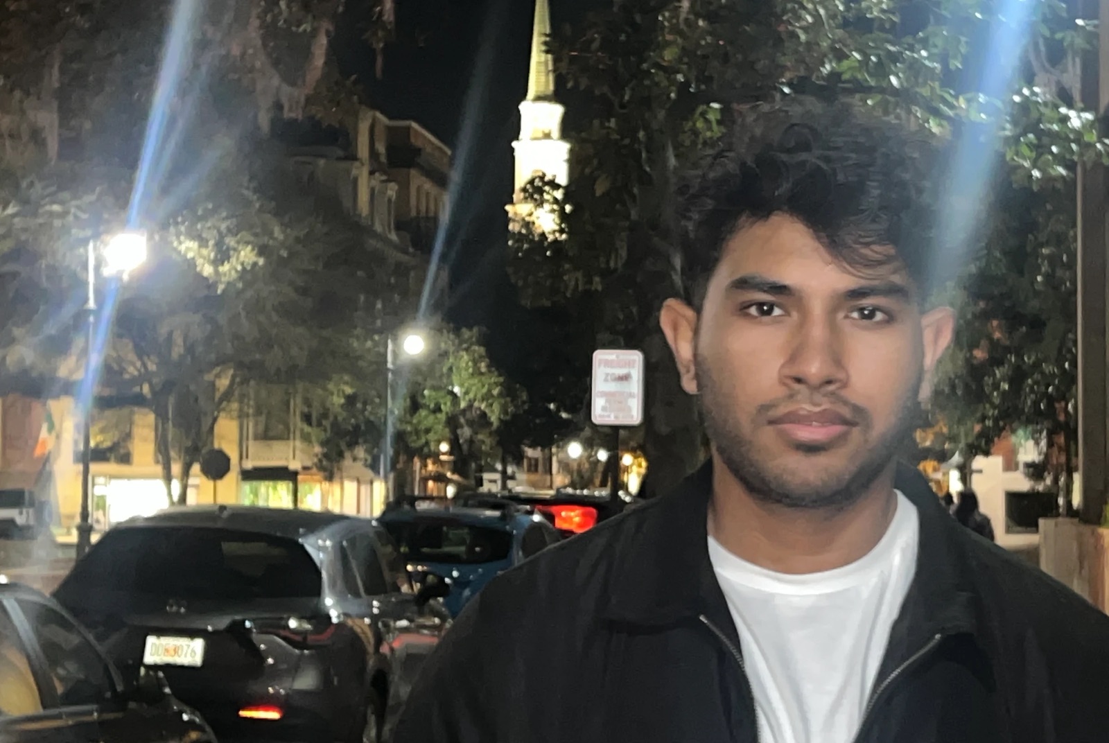 Naimur Rabbi on a city street at night